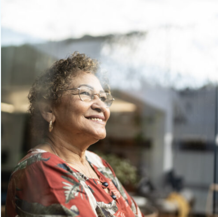 Senior woman contemplating at home