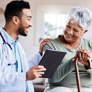 Doctor Smiling with Patient