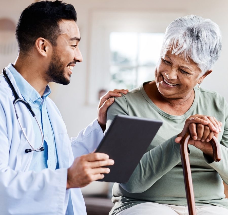 doctor-smiling-with-patient.jpg Doctor Smiling with Patient